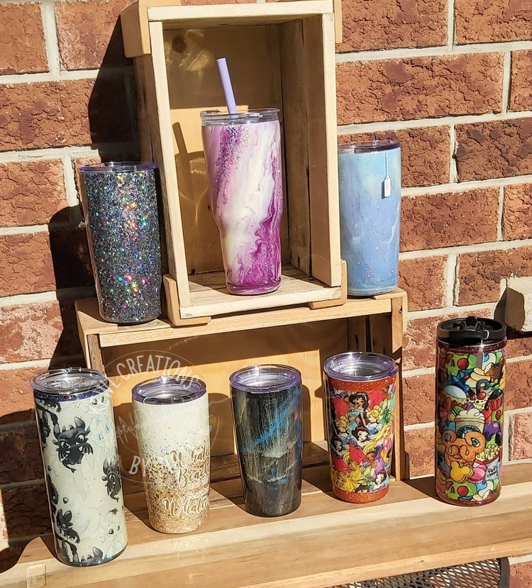 One of a kind tumblers, coffee mugs and water bottles