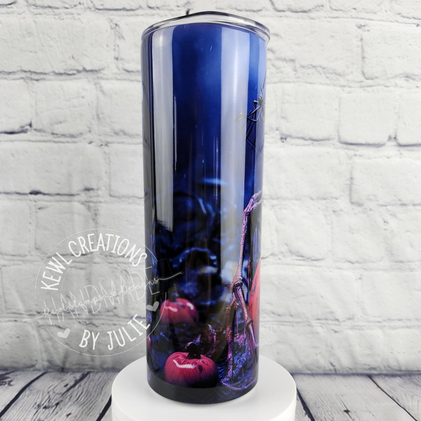 Sublimated "dark", 20oz stainless steel tumbler.